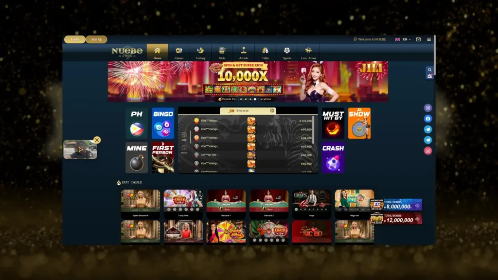 Homepage of Nuebe Gaming displaying an assortment of colorful slot game thumbnails with a scrolling jackpot banner featuring the game provider JILI.